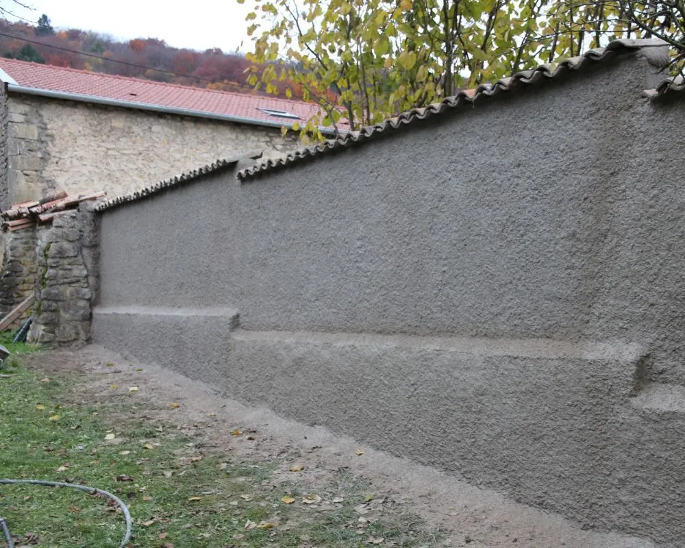 Quelle distance respecter pour construire un mur privatif ?